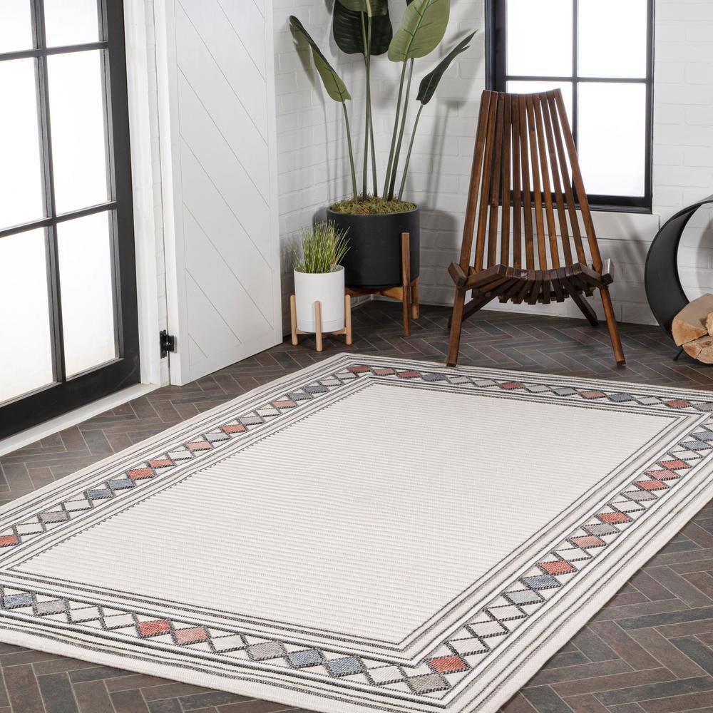 Ivory and Beige Geometric Synthetic 3' x 5' Indoor/Outdoor Rug
