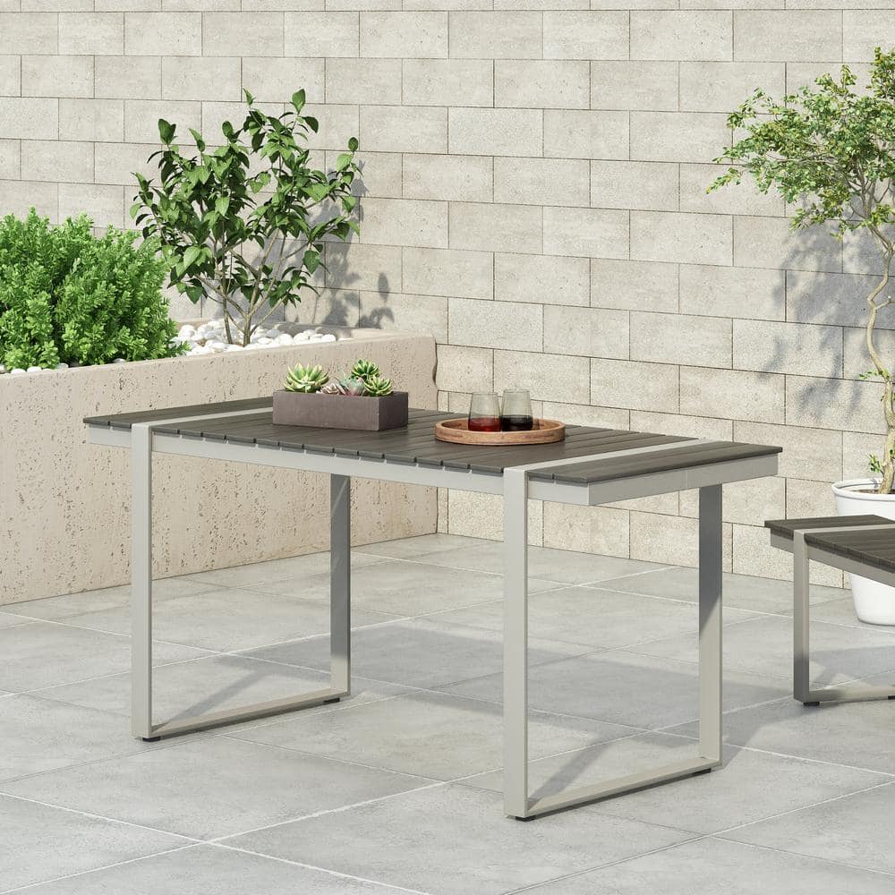 Expandable Aluminum Outdoor Dining Table with Faux Wood Slats and Sled Base