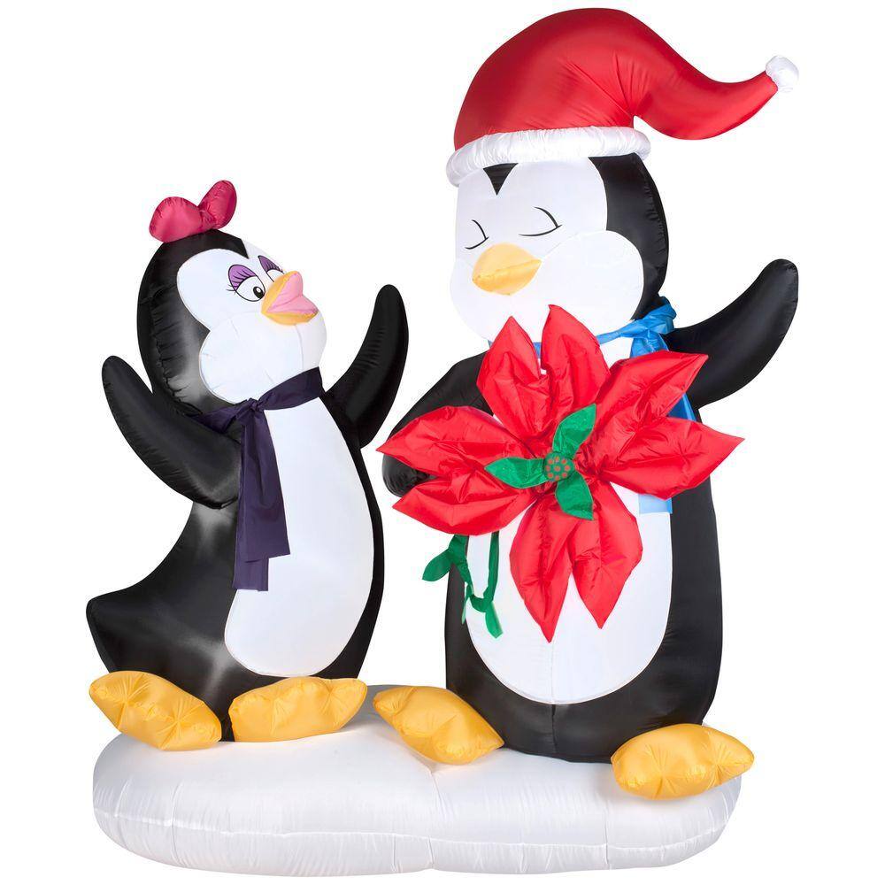 Gemmy 6 ft. H Animated Inflatable Penguin Couple with Poinsettia Flower ...