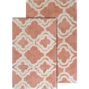 https://images.thdstatic.com/productImages/b694f8ab-850f-49f3-adeb-122eecec99c2/svn/salmon-white-chesapeake-merchandising-bathroom-rugs-bath-mats-36968-64_300.jpg