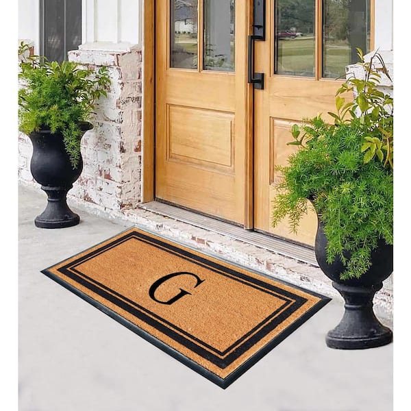 https://images.thdstatic.com/productImages/b6a109af-618a-4539-a372-322f64dbc7f3/svn/black-a1-home-collections-door-mats-a1home200188-g-40_600.jpg
