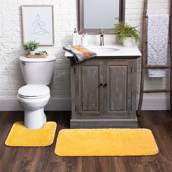 https://images.thdstatic.com/productImages/b6bc0ea2-65ff-42e8-9db7-b61cf37e4445/svn/yellow-mohawk-home-bathroom-rugs-bath-mats-327025-e1_600.jpg