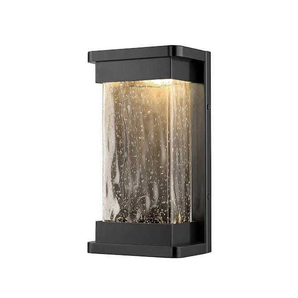 Millennium Lighting Ederle 6.5 in. 1-Light Powder Coat Black Outdoor Wall Sconce with Clear Water Seedy Glass