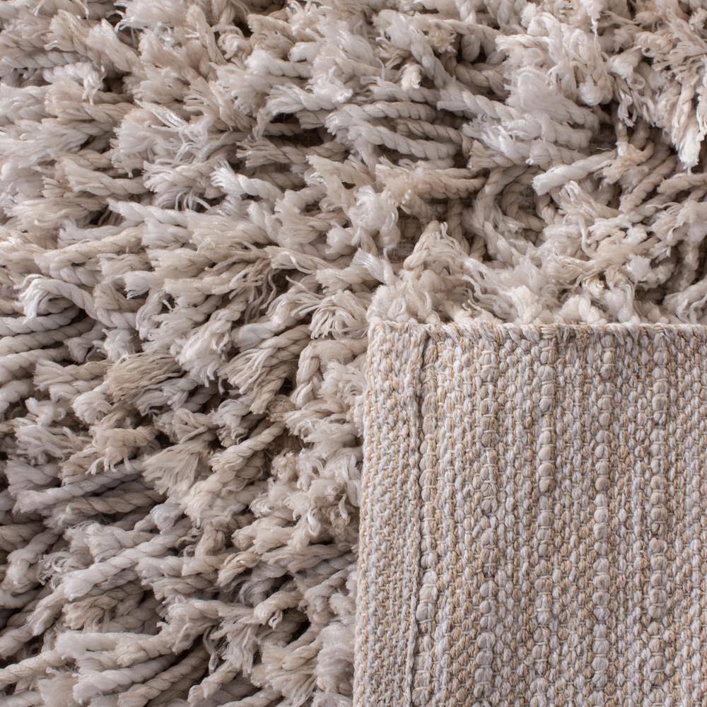 Hand-Tufted Beige/Ivory Synthetic Shag Area Rug, 4' x 6'