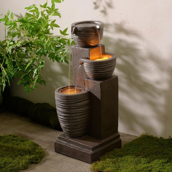 Horizontal Ribbed Pattern Outdoor Cascade Water Fountain with Warm Glow Lighting, Adjustable Flow and Electric Pump