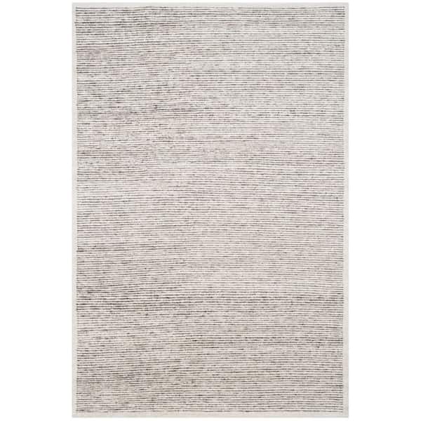 Tibetan 6 ft. x 9 ft. Ivory Solid Color Area Rug