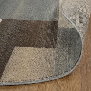 8 ft. Round Grey Round Patchwork Power Loom Stain Resistant Area Rug