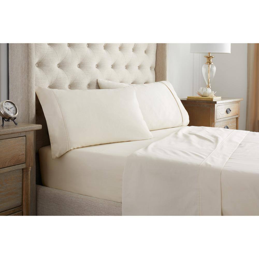 Waverly Sateen 4-Piece Ivory Solid Cotton King Sheet Set Bring color and comfort to your bed with the Waverly 100% Cotton Sateen 400 Thread Count Sheet Set. Made of luxuriously soft 100% Cotton Sateen, these 400 Thread Count Sheet sets are the perfect base layer to any Waverly bedding ensemble. Machine wash cold with like colors. Color: Ivory.