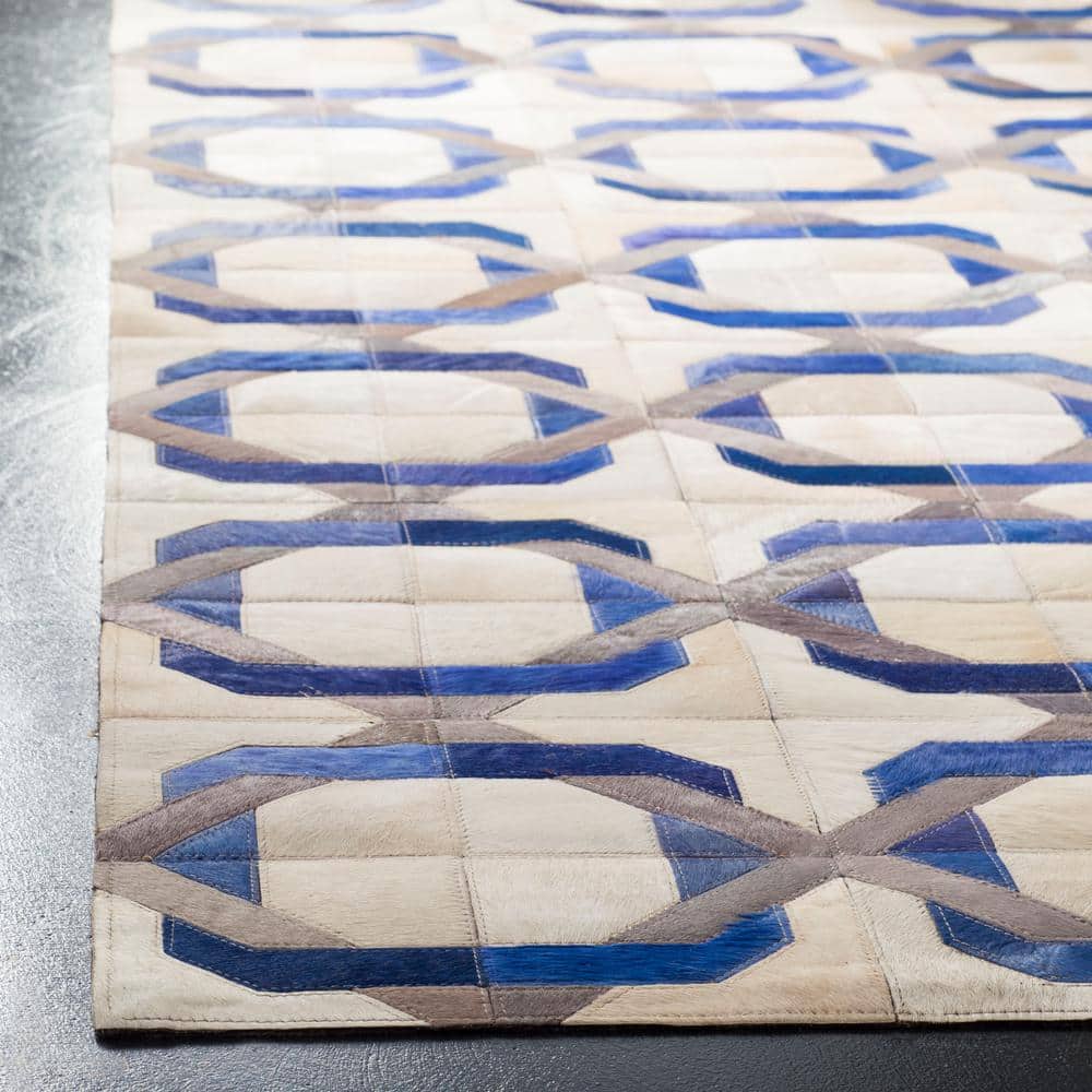 Ivory Geometric Hand-Stitched Cowhide Area Rug - Reversible & Washable