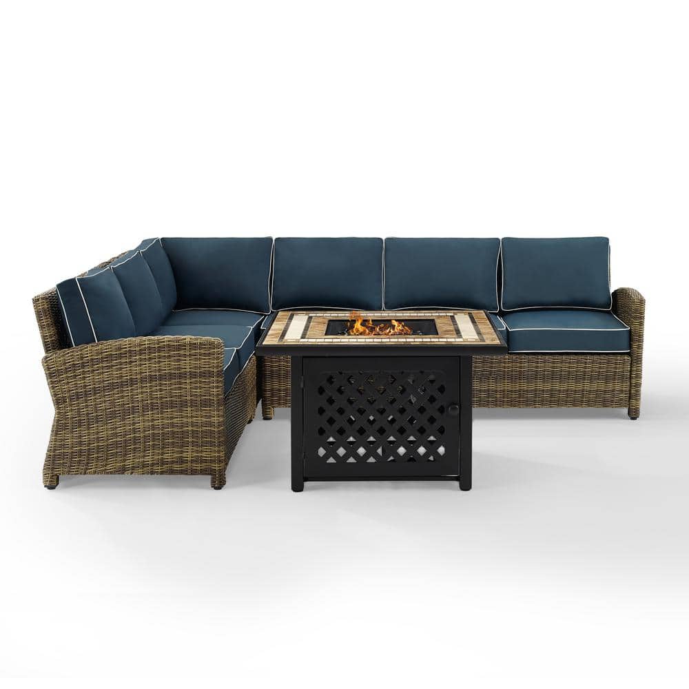 Front view of the Bradenton wicker patio fire pit set with navy cushions.