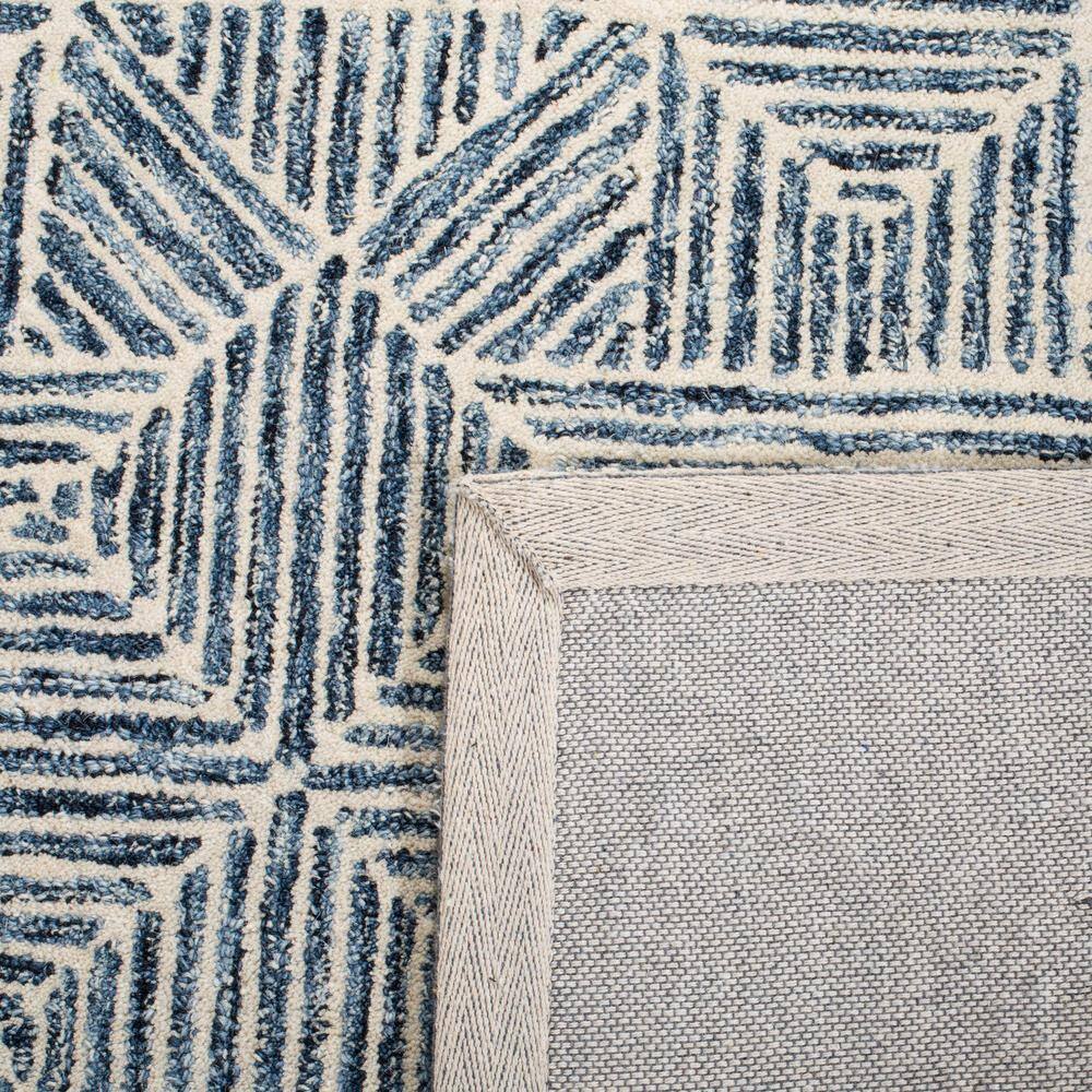 Handmade Blue and Ivory Wool Abstract Area Rug, 5' x 8'