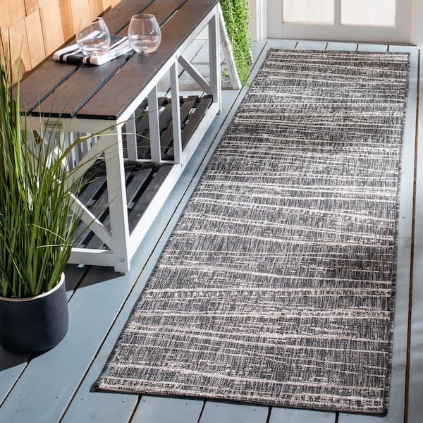 Courtyard Black/Ivory 2 ft. x 9 ft. Abstract Striped Indoor/Outdoor Patio  Runner Rug
