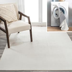 Twyla Classic Cream 5 ft. x 8 ft. Solid Low-Pile Machine-Washable Area Rug