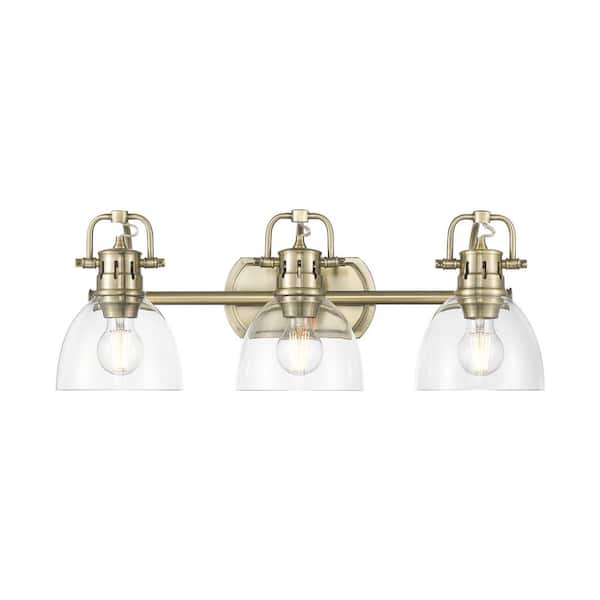 Duncan 8.25 in. 3 Light Aged Brass Vanity Light with Clear Glass Shade