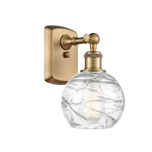 Athens Deco Swirl 1-Light Brushed Brass Wall Sconce with Clear Deco Swirl Glass Shade