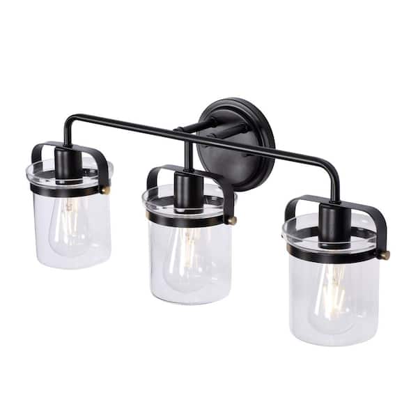 Designers Fountain - Jaxon 24 in. 3-Light Oil Rubbed Bronze Industrial Vanity Light with Clear Glass Shade