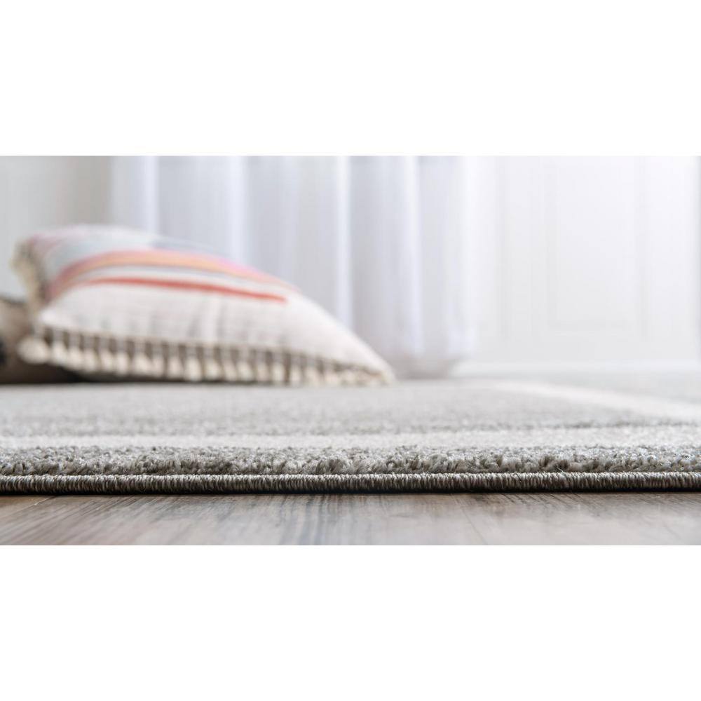 Modern Gray and Ivory 6' x 9' Tufted Synthetic Area Rug