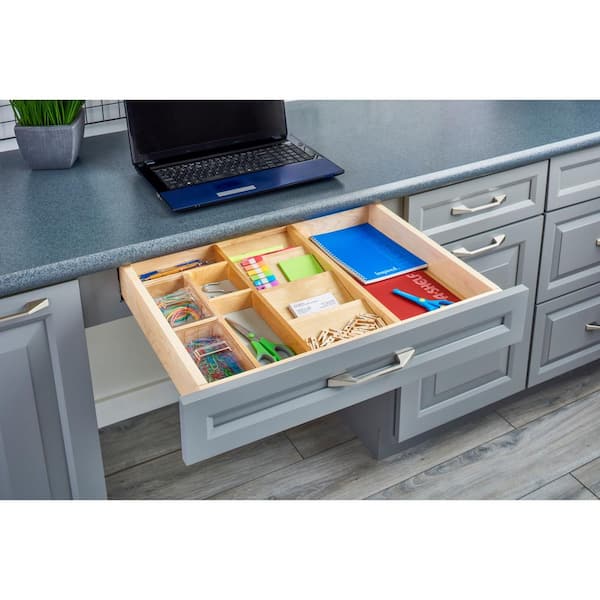 https://images.thdstatic.com/productImages/b790afba-4657-47af-ae3e-a8727ff598db/svn/rev-a-shelf-kitchen-drawer-organizers-4vcos-22-1-4f_600.jpg