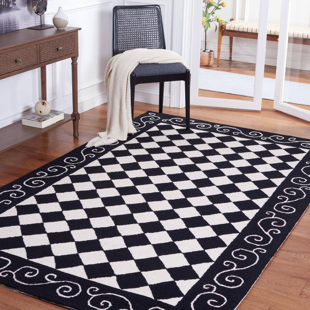 Handmade Black and Ivory Wool Floral Small Rug
