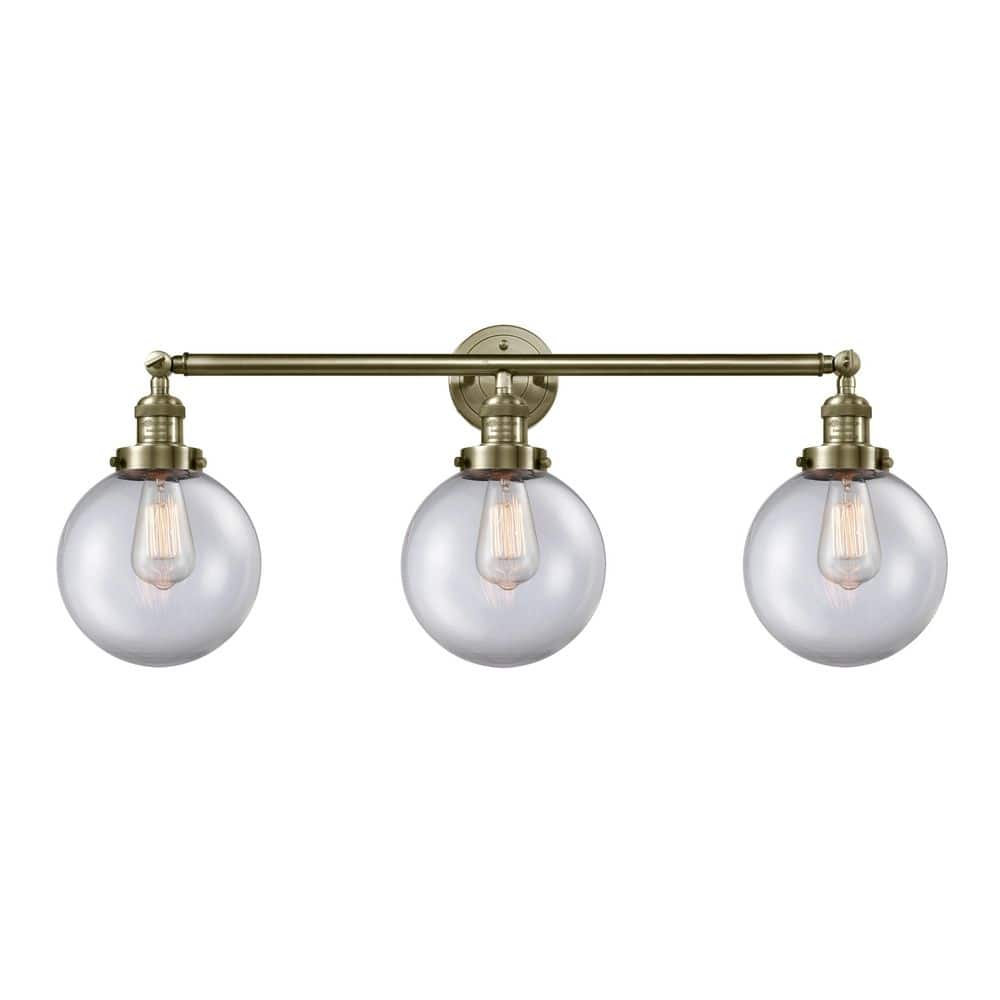 Beacon 32 in. 3-Light Antique Brass Vanity Light with Glass Shade price history on PriceWatchPro