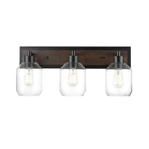 Williamsburg 24 in. 3-Light Matte Black Vanity Light with Faux Wood Accent, Clear Glass Shades