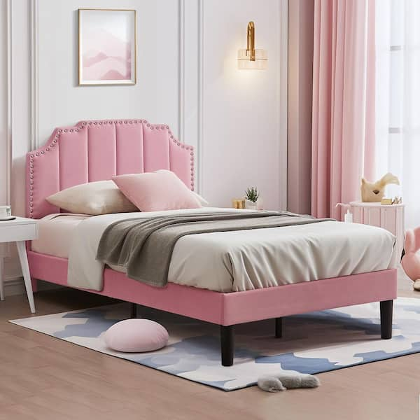 Twin pink on sale upholstered bed