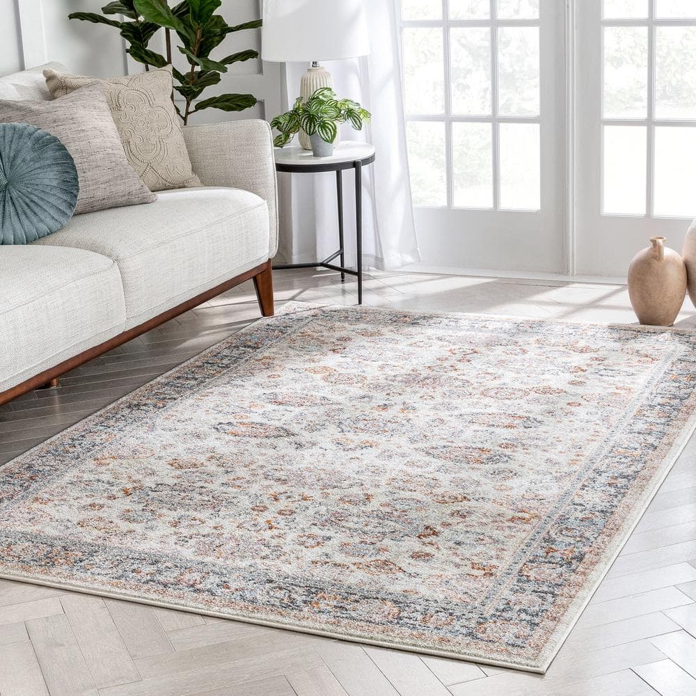 Ivory Floral Synthetic Reversible 5' x 7' Area Rug