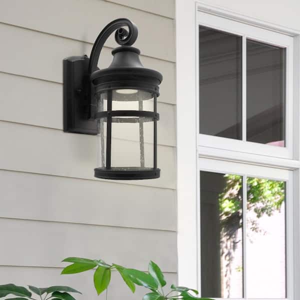1-Light Black LED Outdoor Wall Lantern Sconce with Seeded Glass and Dusk to Dawn Sensor