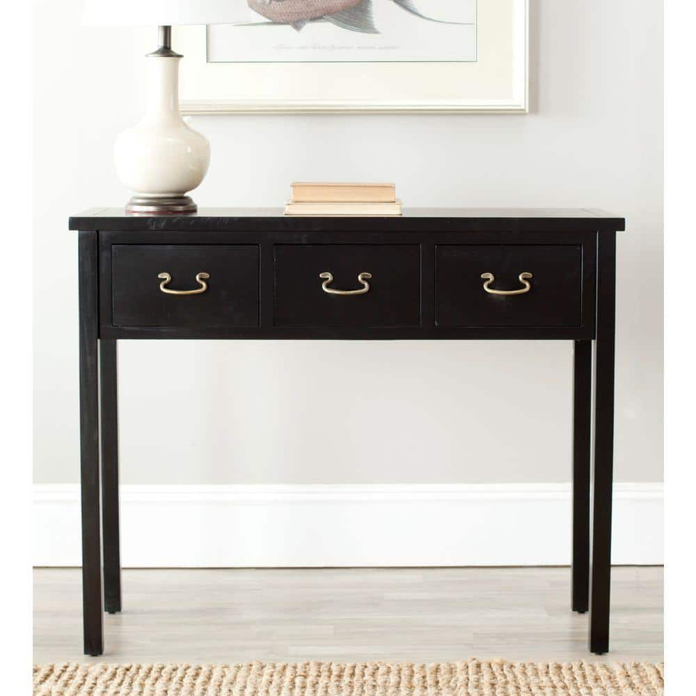 https://images.thdstatic.com/productImages/b7ec9f33-2d56-4a68-84fb-fb2c7cec705d/svn/black-safavieh-console-tables-amh6568b-64_1000.jpg