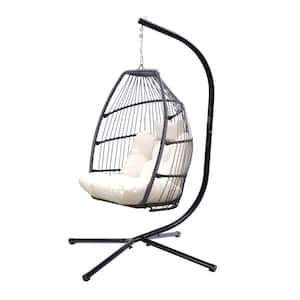 1-Person Black Metal Frame Patio Swing with Grey Rattan Basket and Light Beige Cushion and Pillow