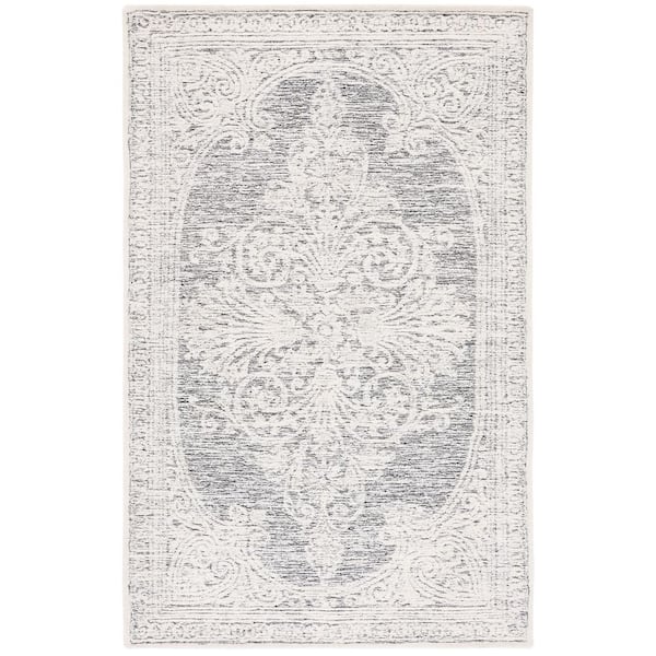 SAFAVIEH Metro Ivory/Black 5 ft. x 8 ft. High-Low Floral Area Rug