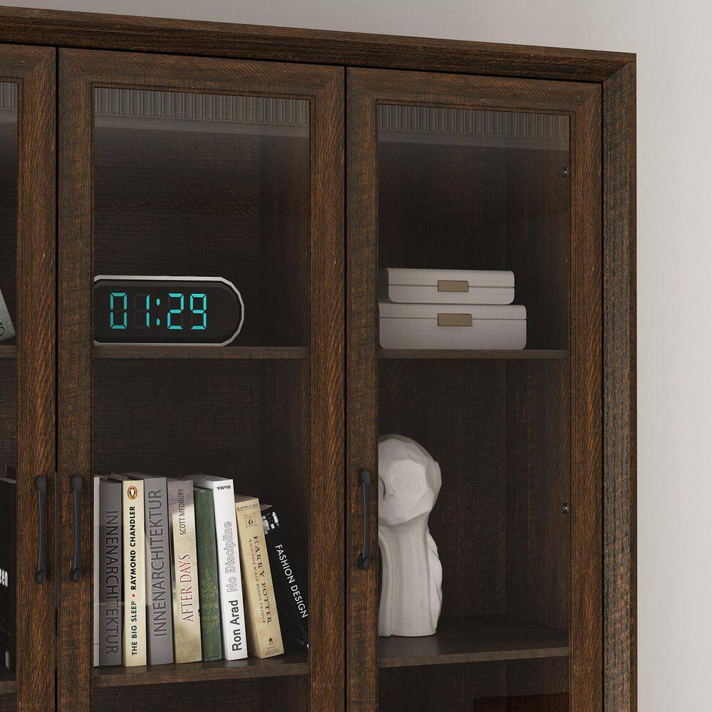 Close-up of the glass doors and interior shelving of the walnut cabinet.
