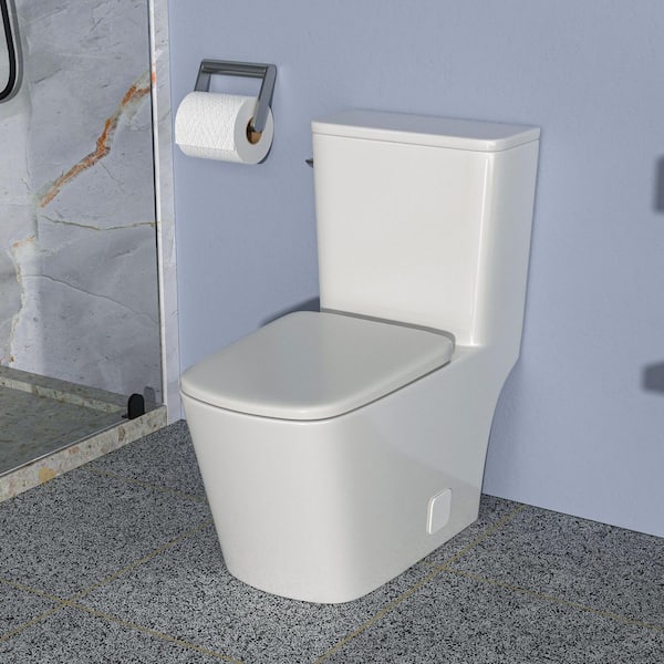 12 in. Rough-In 1-Piece 1.28 GPF Single Flush Elongated Toilet in White Seat Included