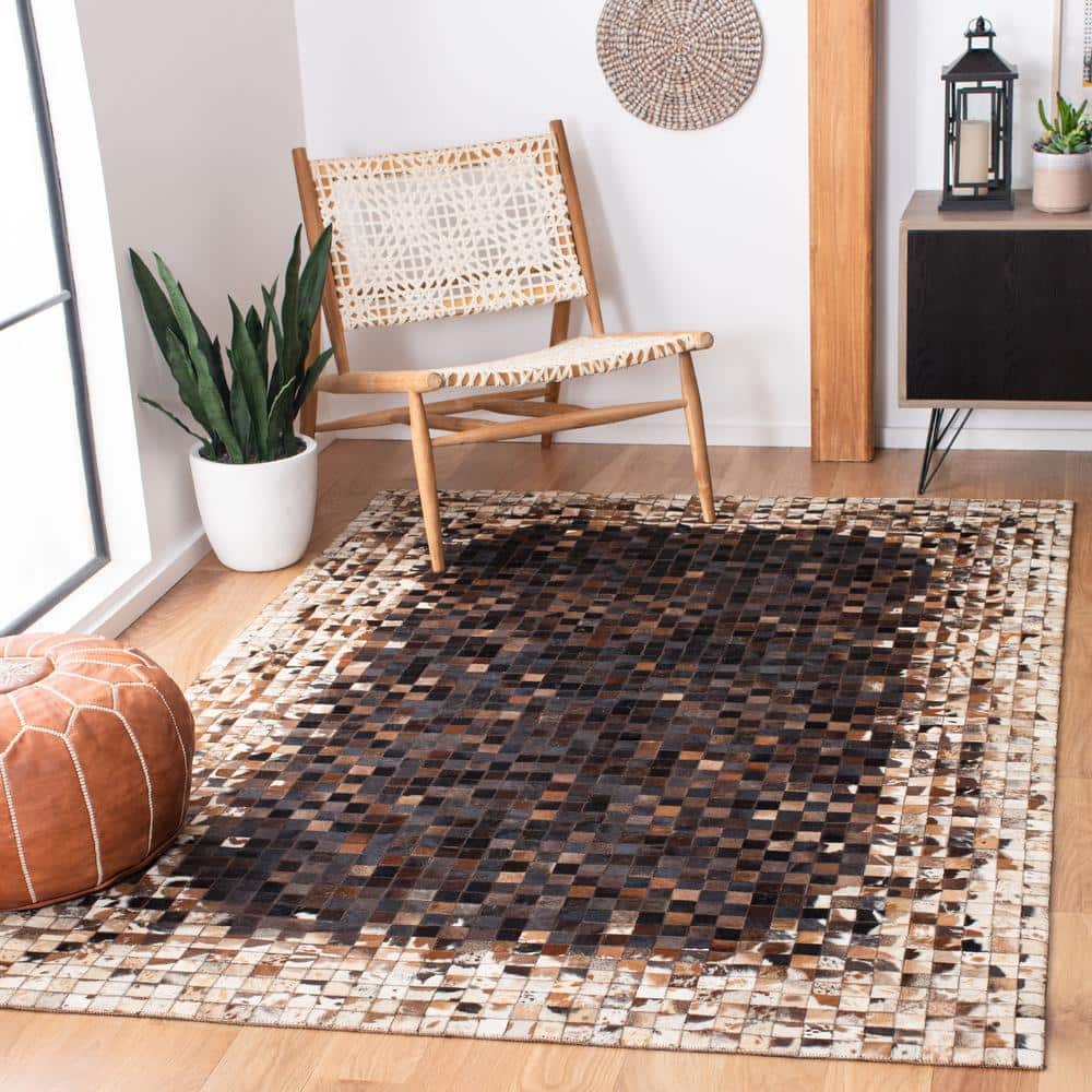 Hand-Knotted Black and Beige Geometric Cowhide Area Rug