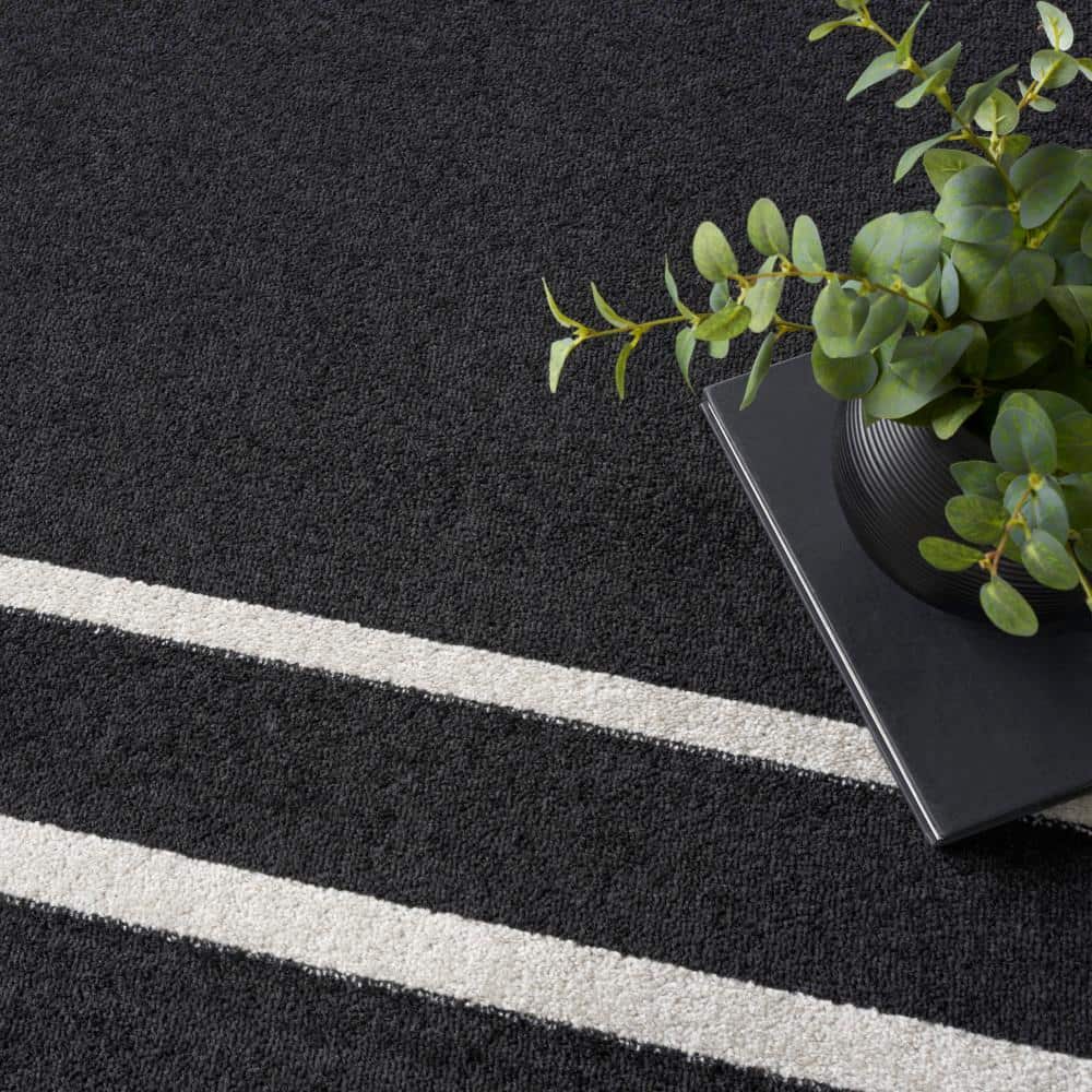Black Ivory 10' x 14' Solid Synthetic Indoor/Outdoor Rug