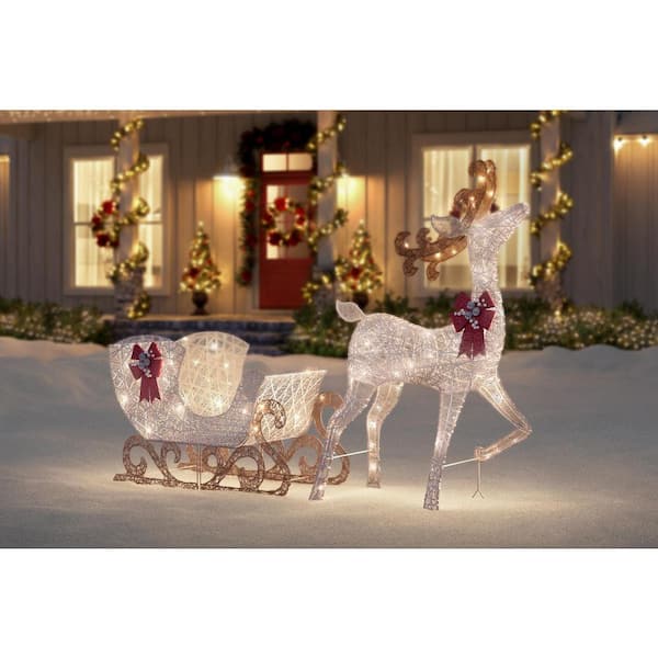 Home Accents Holiday 5 Ft Polar Wishes, Outdoor Light Up Santa Sleigh And Reindeer