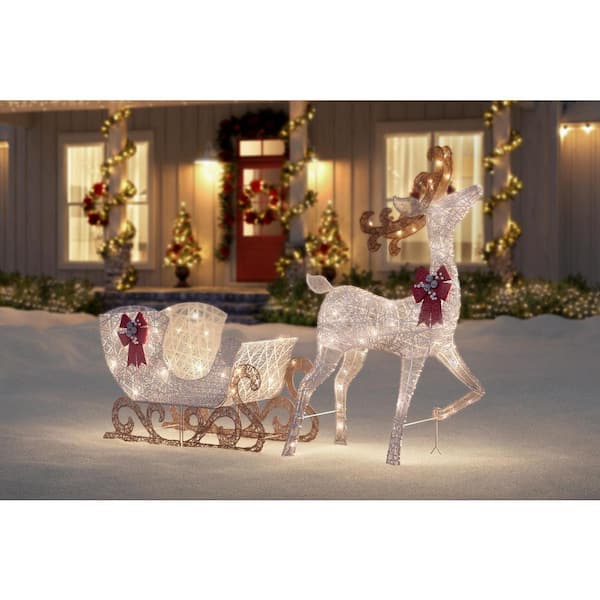 Reviews for Home Accents Holiday 5 ft Polar Wishes Reindeer Outdoor  Decoration with Sleigh and 280 LED Lights