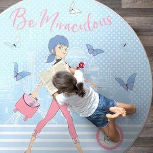 Miraculous Ladybug Light Blue 5 ft. 3 in. Be Miraculous Round Area Rug