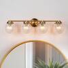 Modern 4-Light Brass Vanity Light Linear Bathroom Washroom Powder Room Wall Light With Globe Clear Cracked Glass Shades