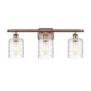 Cobbleskill 26 in. 3-Light Antique Copper Vanity Light with Deco Swirl Glass Shade