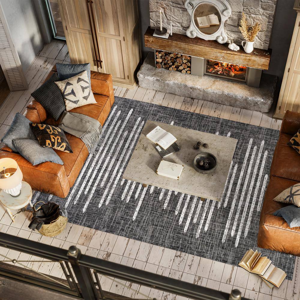 Zolak 4' x 6' Black and Ivory Synthetic Stripe Rug