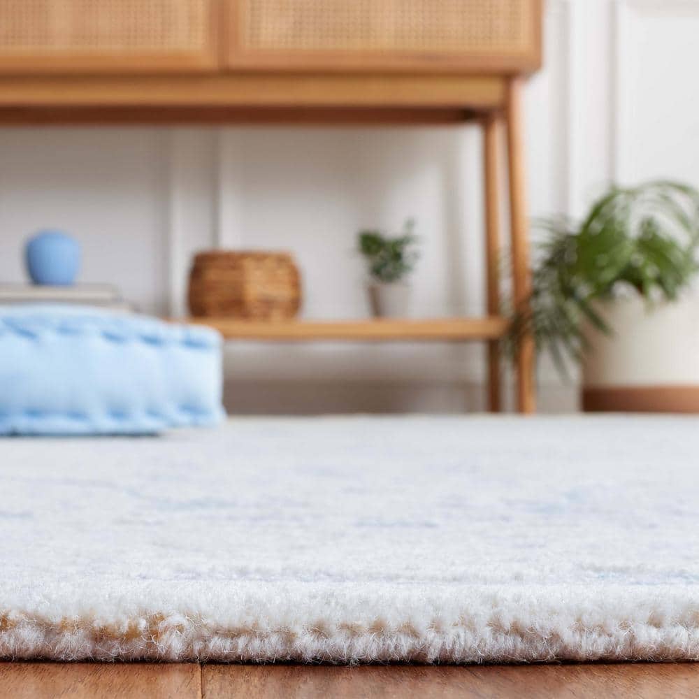 Blue Ivory Handmade Tufted Wool 8' x 10' Area Rug