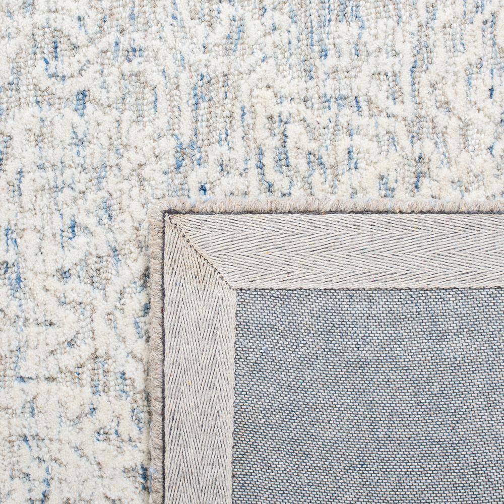 Light Blue and Ivory Floral Wool 8' x 10' Handmade Tufted Rug