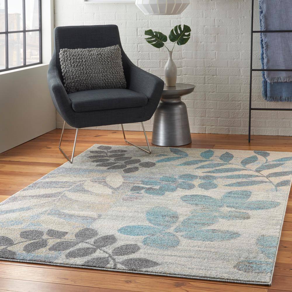 Ivory and Light Blue Floral Synthetic 6' x 9' Area Rug