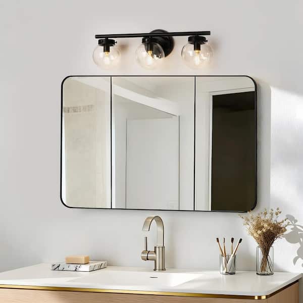 Industrial Black Bathroom Vanity Light, 19.5 in. 3-Light Modern Transitional Globe Wall Sconce with Clear Glass Shades