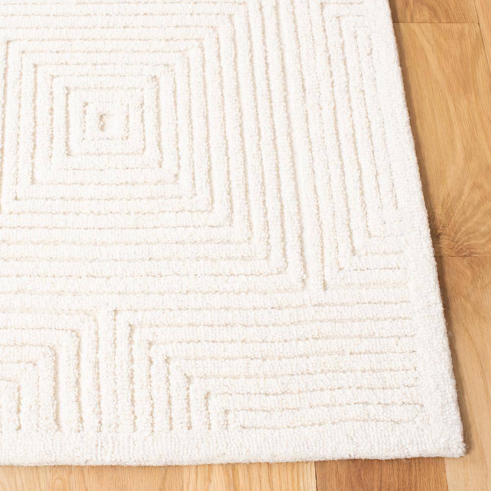 Ivory Geometric Handmade Wool Round Tufted Rug