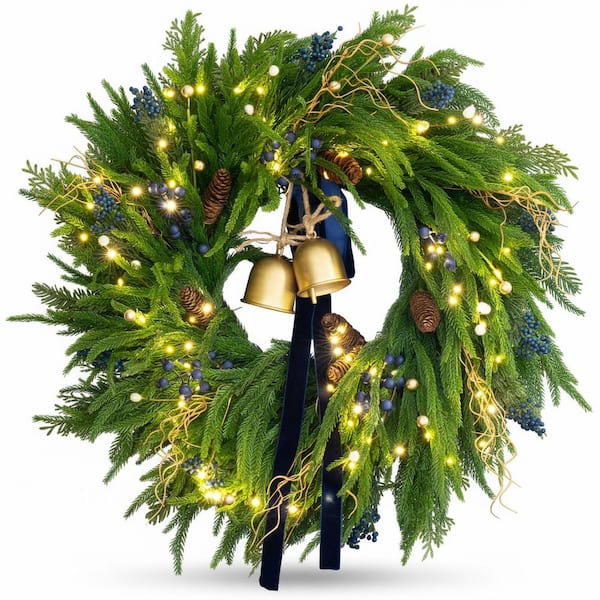 24 in. Green Pre-Lit Norfolk Pine Artificial Christmas Wreath with Velvet Ribbon, Pinecones, Berries and Bells