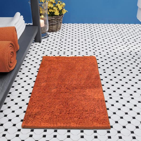 https://images.thdstatic.com/productImages/b8b508a9-3853-45c1-98bd-f6df0dc646dd/svn/coral-resort-collection-bathroom-rugs-bath-mats-ymb005490-4f_600.jpg