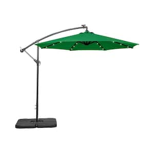 Bayshore 10 ft. Outdoor Patio Crank Lift LED Solar Powered Cantilever Umbrella with 4-Piece Base Weights in Dark Green