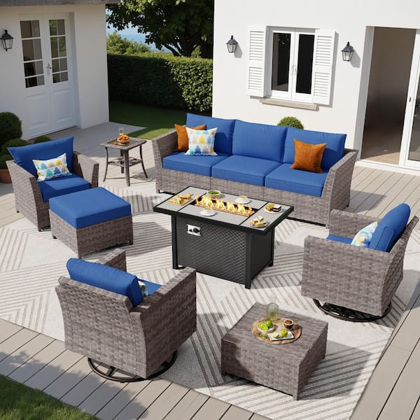 XIZZI Jasmine 10-Piece Wicker Patio Rectangular Fire Pit Set with Navy Blue Cushions and Swivel Rocking Chairs